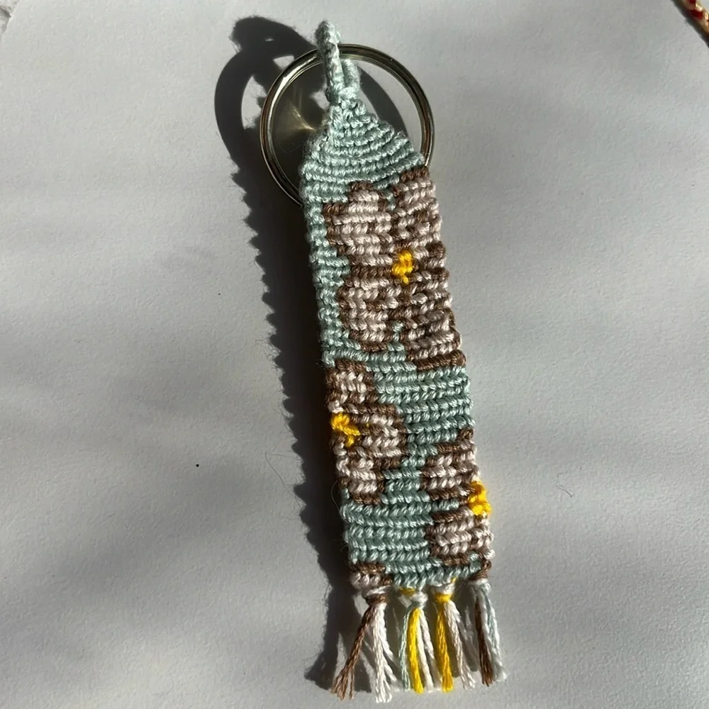 Handmade woven blue floral keychain
